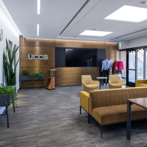 Interior of Career Center with UCCS logo on wall