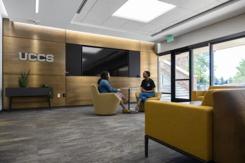photo of two students sitting in chairs in Career Center