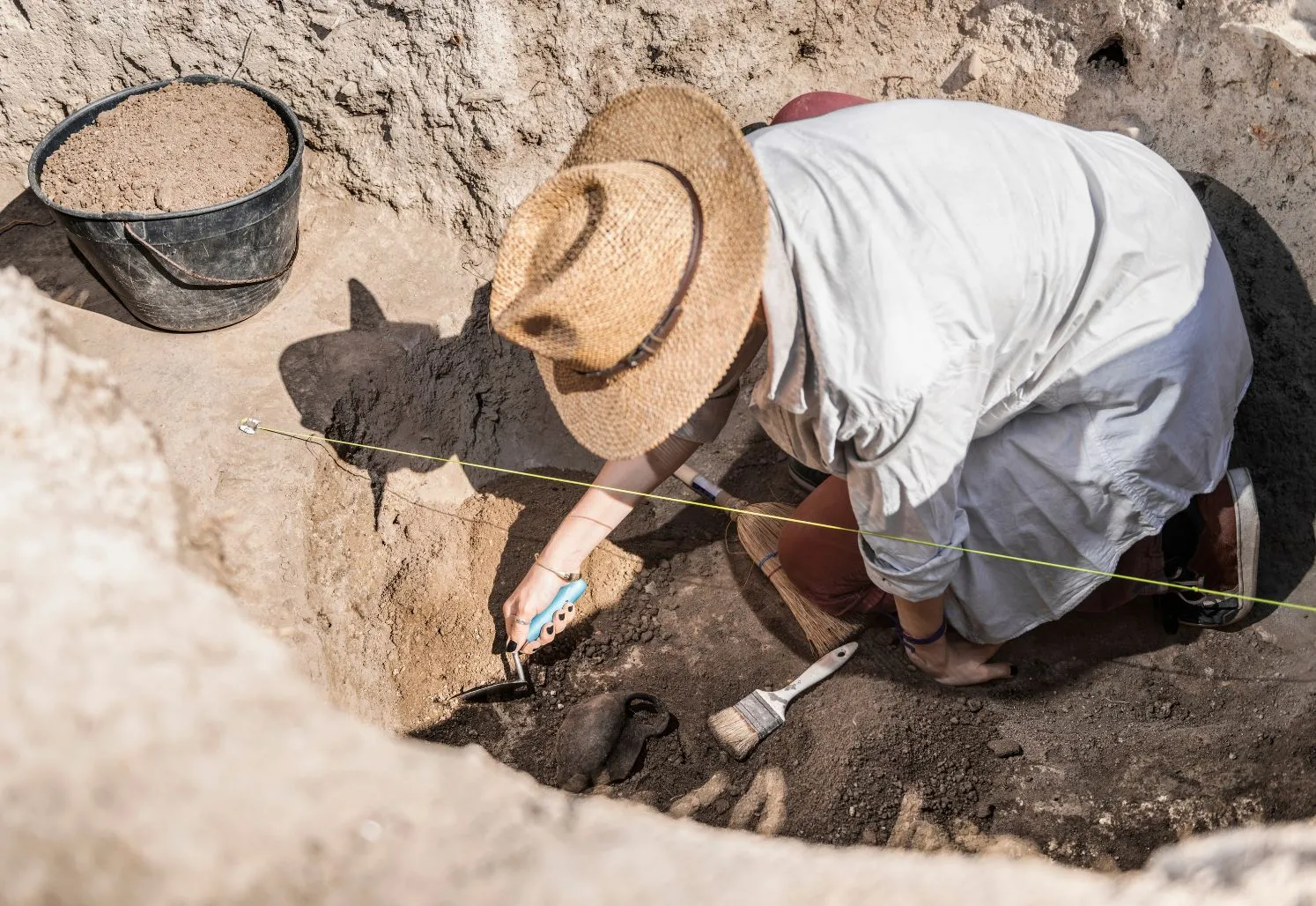 Archaeologist at Dig Site